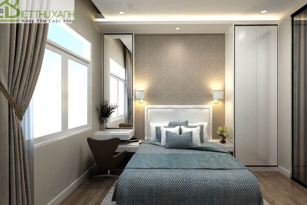 Phòng ngủ master tràn ngập ánh sáng tự nhiên với cách bố trí đơn giản